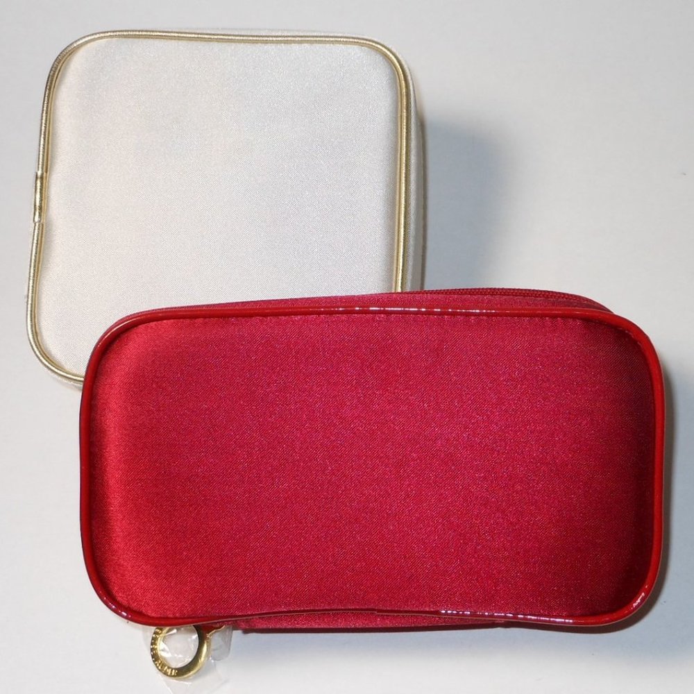 2 new Estee Lauder made up cases.
